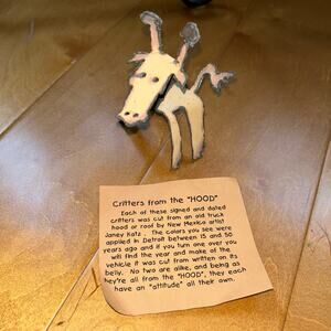 Welded metal sculpture Critter from the HOOD 1970 dodge truck Janie Katz